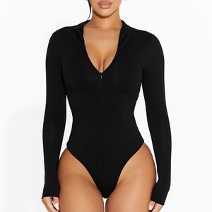 Naked Wardrobe The NW Zip It Low Bodysuit in Black